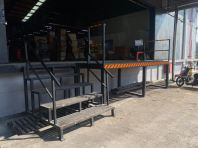 Heavy-Duty Steel Loading Platform with Staircase & Safety Railing for Warehouse Operations