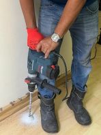 ANTI-TERMITE TREATMENT BY SLAB DRILLING AND CHEMICAL INJECTION