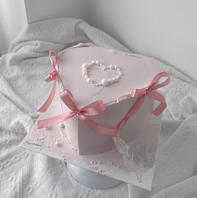 Pink Heart Shape Pearl and Ribbon Cake Design