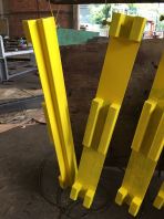 Custom Metal Fabrication with Yellow Painting