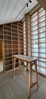 Floor-to-Ceiling Library Shelving with Display Partition Floor-to-Ceiling Library Shelving with Display Partition